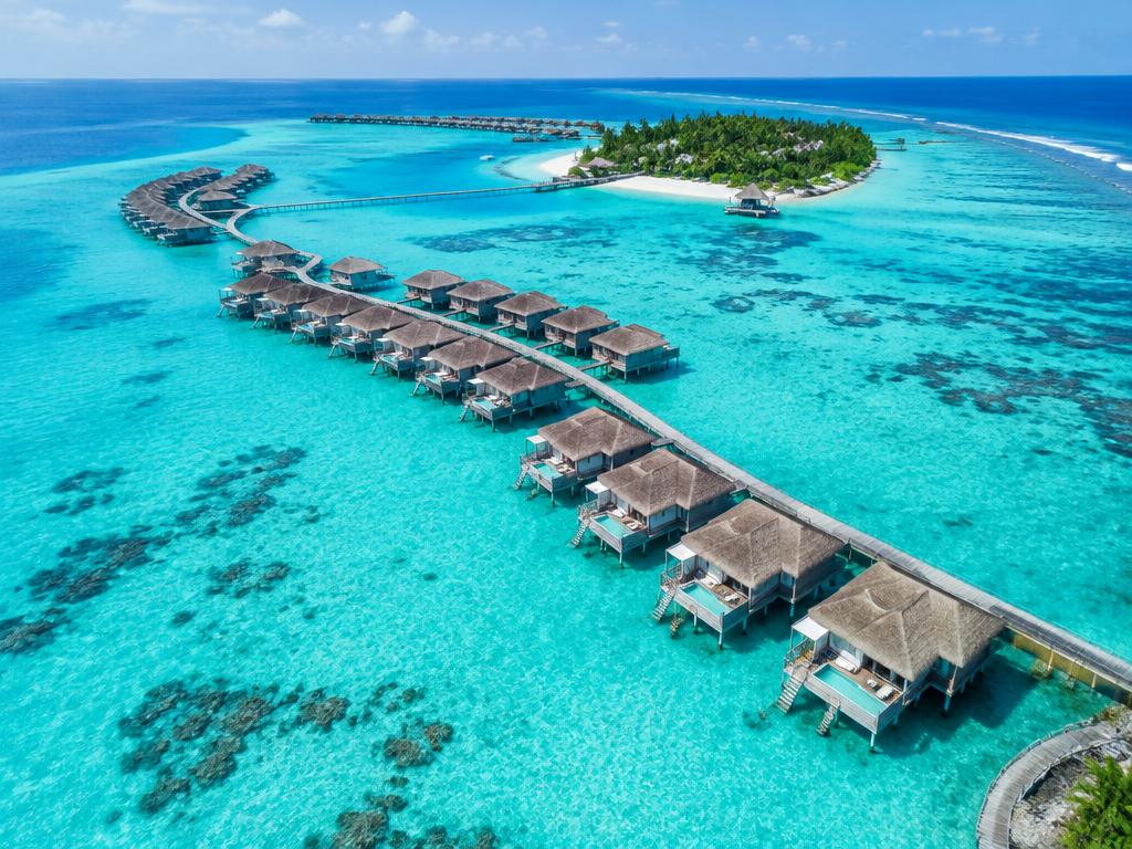 Overwater villas at sunrise